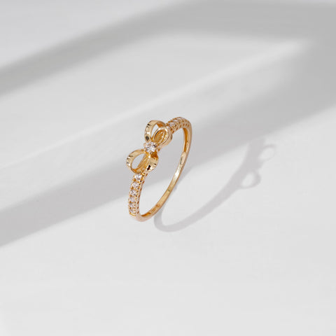 Amazon Essentials 10K Gold Dainty Bow Ring set with Round Cut Infinite Elements Cubic Zirconia (.216 cttw), Size 5 (previously Amazon Collection) Amazon Essentials