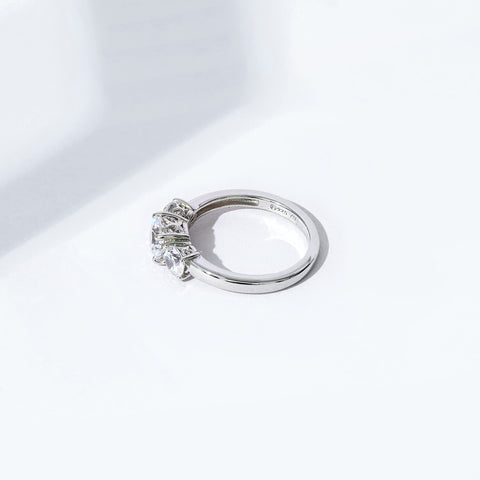 Amazon Essentials Platinum-Plated Sterling Silver Round 3-Stone Ring made with Infinite Elements Cubic Zirconia (2 cttw), Size 7 (previously Amazon Collection) Amazon Essentials
