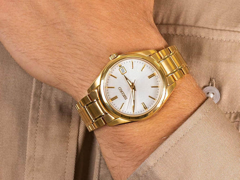 Seiko SUR314 Watch for Men - Essentials - White Dial, Date Calendar, LumiBrite Hands, Gold-Tone Stainless Steel Case & Bracelet, and 100m Water Resistant SEIKO