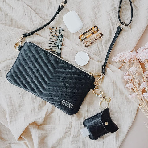 Itzy Ritzy Boss Pouch Wristlet, Crossbody Clutch & Belt Bag - Black Clutch Purse for Women - Includes Crossbody Strap & Wristlet Strap - Features 6 Card Slots & 2 Zippered Pockets (Jetsetter) Itzy Ritzy