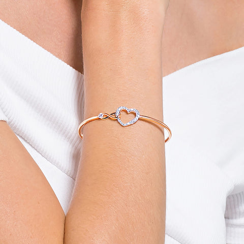 Swarovski Infinity Heart Women's Bangle Bracelet with a Rose-Gold Tone Plated Bangle, Clear Swarovski Crystals and Lobster Clasp SWAROVSKI