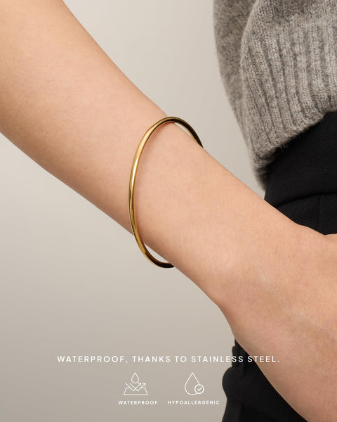 PAVOI 14K Yellow Gold Plated Bangle Bracelet for Women | Classic Lightweight Stacking Stainless Steel Bracelet | 2-Pack Bangles Small/Medium Size