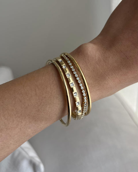 PAVOI 14K Yellow Gold Plated Bangle Bracelet for Women | Classic Lightweight Stacking Stainless Steel Bracelet | 2-Pack Bangles Small/Medium Size