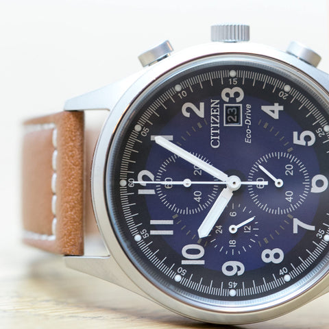 Citizen Men's Eco-Drive Weekender Garrison Chronograph Field Watch in Stainless Steel with Brown Leather strap, Blue Dial (Model: CA0621-05L) Citizen