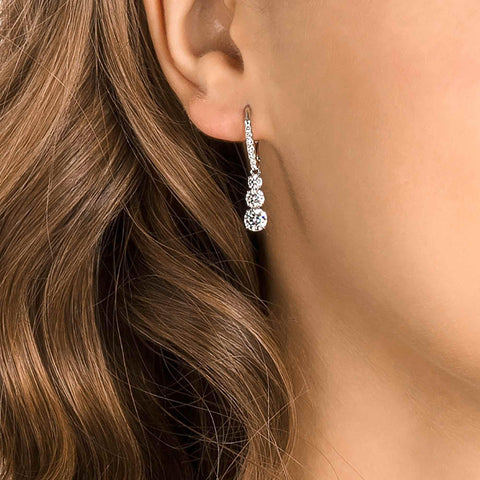 Swarovski Stilla Attract Trilogy Drop Pierced Earrings with White Crystals on a Rhodium Plated Setting with Hinged Closure