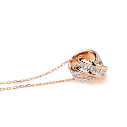 SWAROVSKI Further Collection Women's Necklace, Intertwined Circle Pendant with White Crystals and Rose-Gold Tone Plated Chain SWAROVSKI