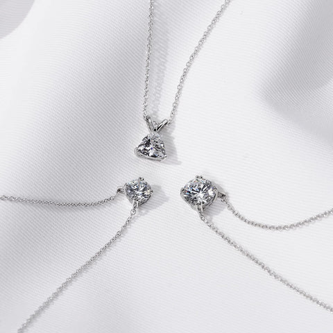 Amazon Collection Platinum Plated Sterling Silver Solitaire Pendant Necklace set with Round Cut Infinite Elements Cubic Zirconia (1 cttw), 18" Amazon Essentials